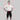 Man wearing white and black HyperTech FastSuit cycling suit with short sleeves on gray background