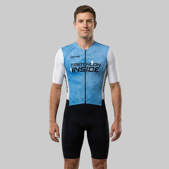 Man wearing blue and black TechBoost FastSuit triathlon suit with "Triathlon Inside" text