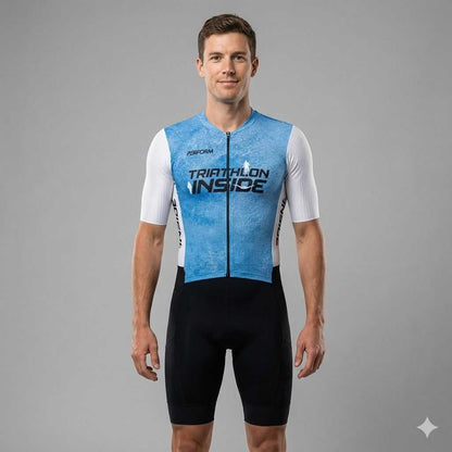 Man wearing blue and black TechBoost FastSuit triathlon suit with "Triathlon Inside" text