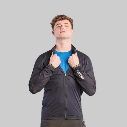Man wearing black TechBoost Running Jacket for men, lightweight, wind and water-resistant with breathable fabric
