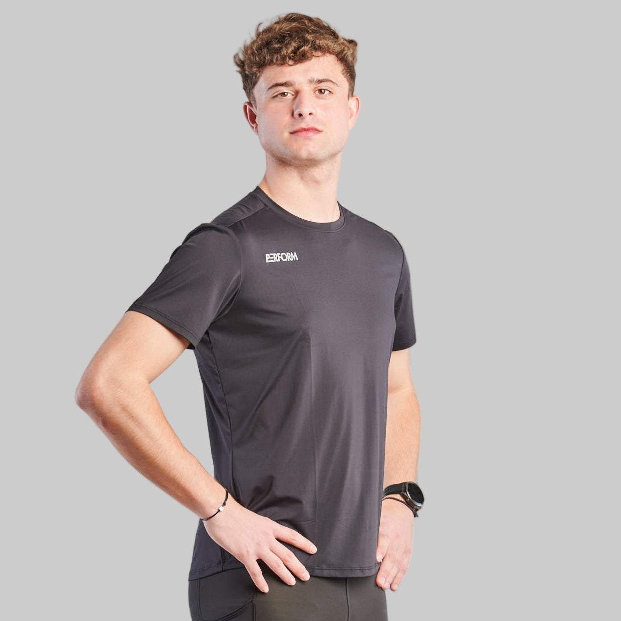Man wearing black Comfort T-Shirt designed for movement and comfort